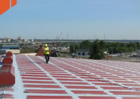 J Smucker Contracting surveys a roof with commercial coating
