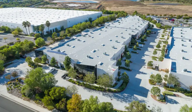 Commercial flat roof building with commercial roof coating