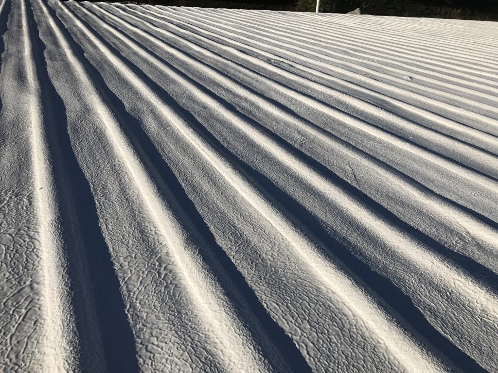 Metal roof coating results after determining "what is the best coating for metal roof longevity?"